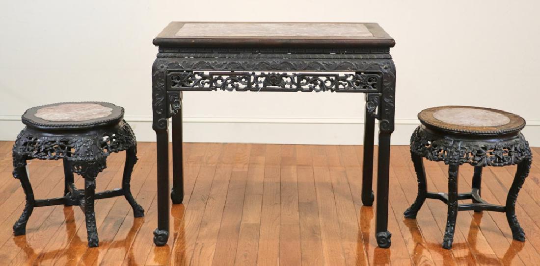 Chinese Export Plants Stands and Table: Chinese export pieces to include a marble-top console table, 32 1/2" H x 35" W x 18 1/4" D and two (2) marble-top plant stands, each approximately 19" H x 18 1/2" diameter. Provenance: Manchester, Mas