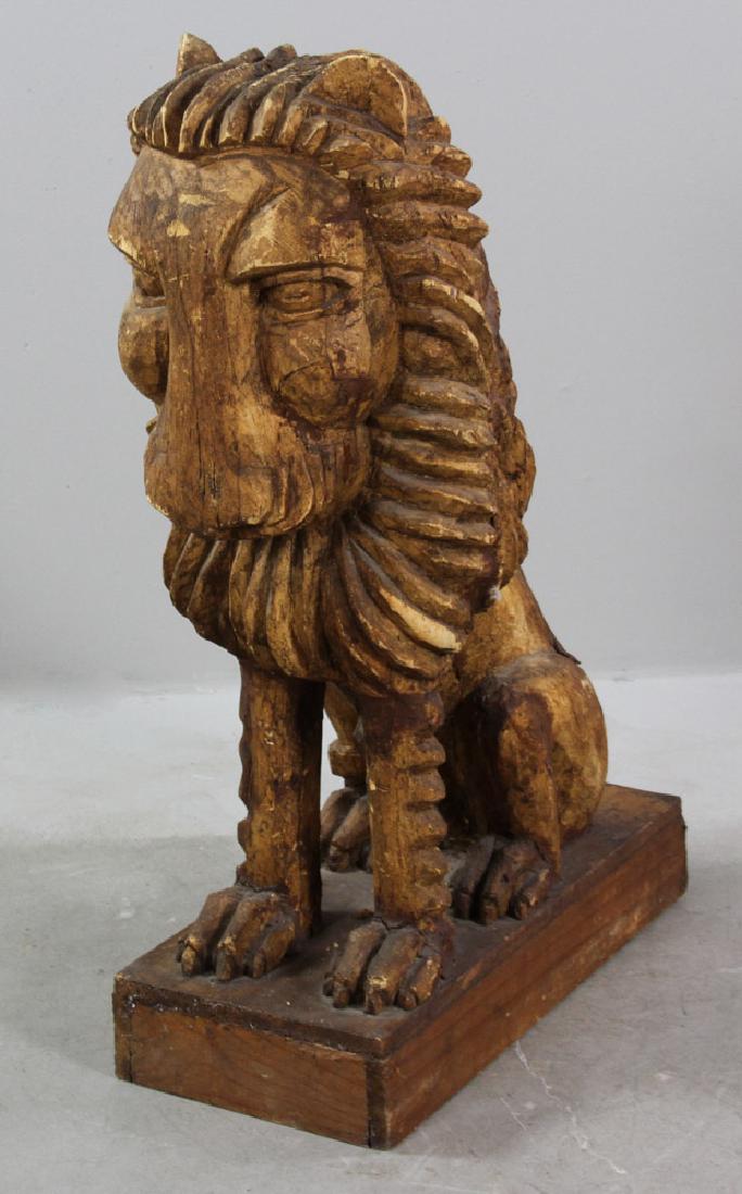 Antique Folk Art Carved Wooden Lion: Antique folk art carved wooden lion in the manner of Maine artist Bernard Langlais, 28 1/2" H x 22" W x 10" D. Provenance: Florida estate.