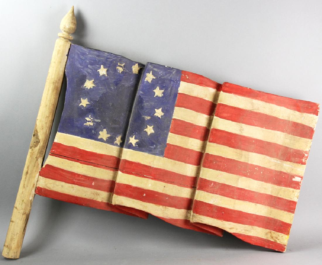 Folk Art Painted Wood American Flag: Folk art painted wood American flag, 30 1/2" x 32". Provenance: Beverly, Massachusetts.