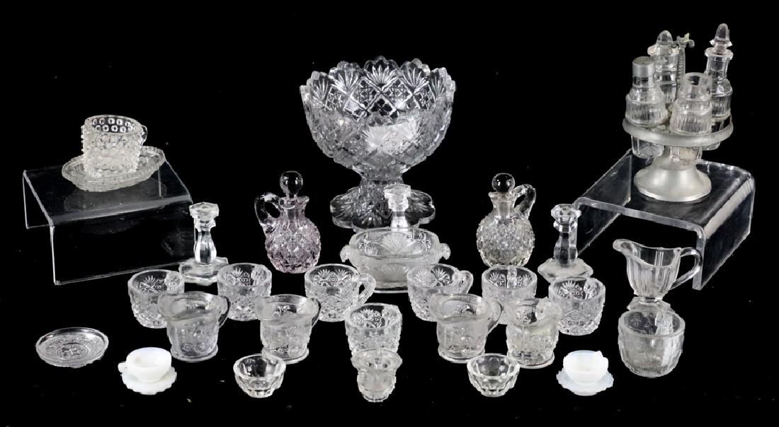 Group of 19thC Glass Toys and Whimsies: Collection of 19th century glass toys and whimsies to include: pedestal punch bowl with six (6) matching punch cups, Flattened Diamond Thumbelina pattern; Sandwich Glass Lacy pieces; condiment set in 