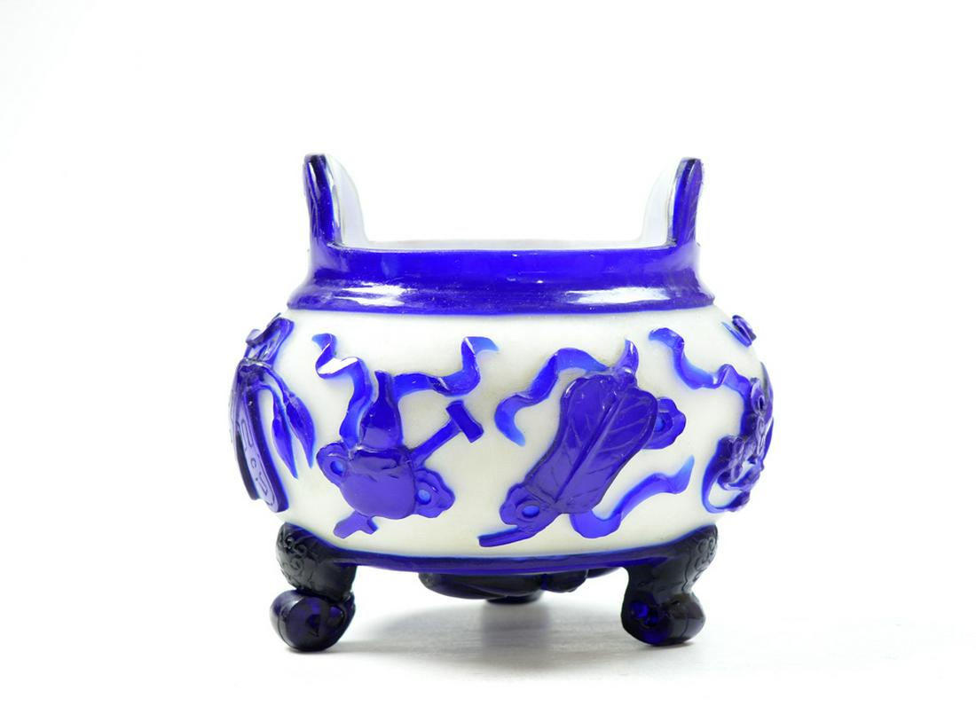 Chinese Peking Glass Incense Burner: Multi-layered Peking glass incense burner decorated with Buddhist eight emblems around. Early 20th century. 6" diameter.