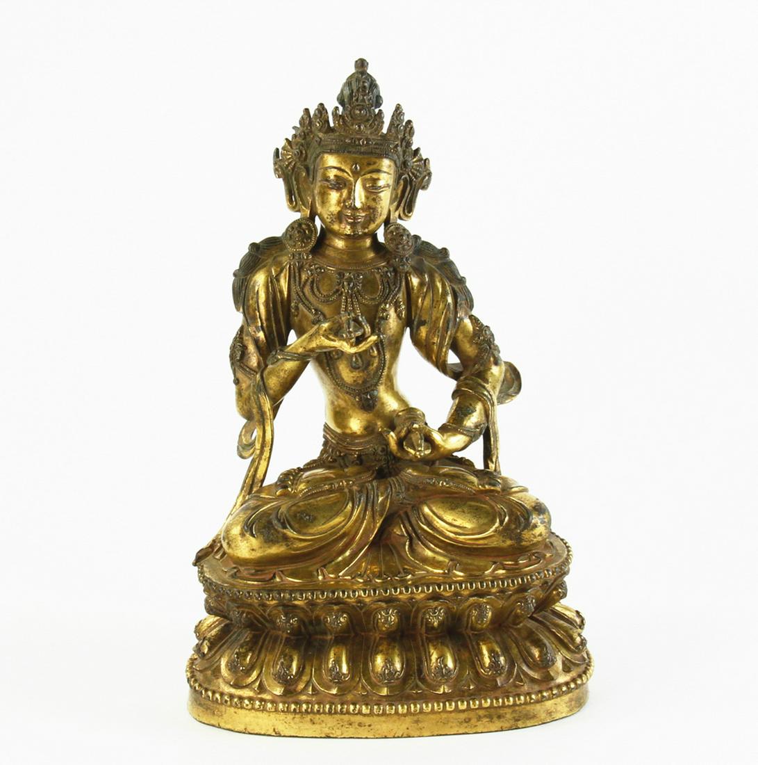 13/14thC Chinese Ming Bronze Buddha Figure: 13th/14th century Chinese Ming bronze cross-legged seated Buddha figure on lotus throne, two hands holding multiplier, carved flower mark on base, carved Ming Yongle mark in front of Buddha, 10" H. Pr