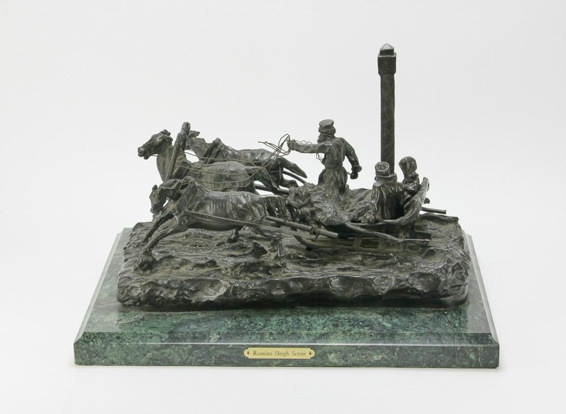 Bronze Russian Sleigh Scene Signed Grachev: Russian sleigh scene, bronze sculpture on green marble base, bearing signature in Cyrillic for Vassili Grachev, sculpture 10" H x 16" W x 10" D, overall on base 12 1/2" H x 18" W x 15" D.