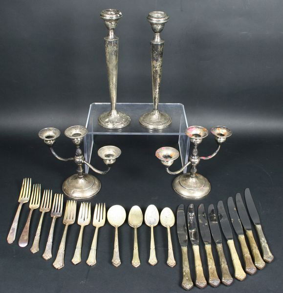 Collection of Sterling.: Collection of sterling to include; (2) tall candlesticks 10 1/2"h., (3) branch candelabras weighted and sterling silver flatware by Oneida, private distribution, State House, stately pattern; (8) kniv
