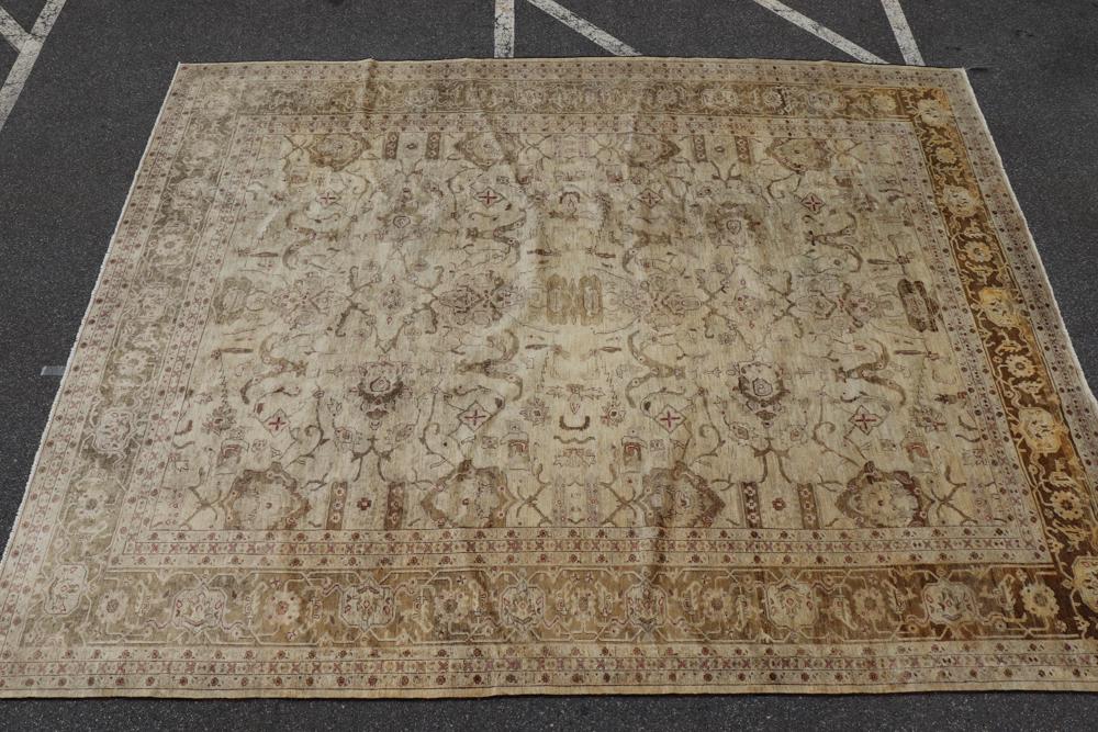 Semi Antique Oushak Rug: Semi antique tan, cream and brown Oushak rug, needs cleaning, 11' 3" x 14' 8". Provenance: From a Florida estate.