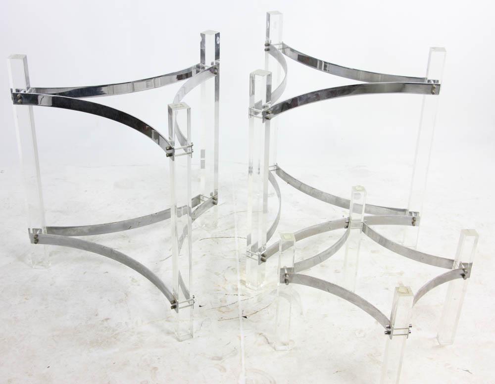Set of Three Lucite Tables: Set of three (3) lucite tables, all lacking tops, two (2) measure 29" h x approximately 26 1/4" W, one measures 15" h x approximately 16" W. Provenance: South Hampton, New York collection.