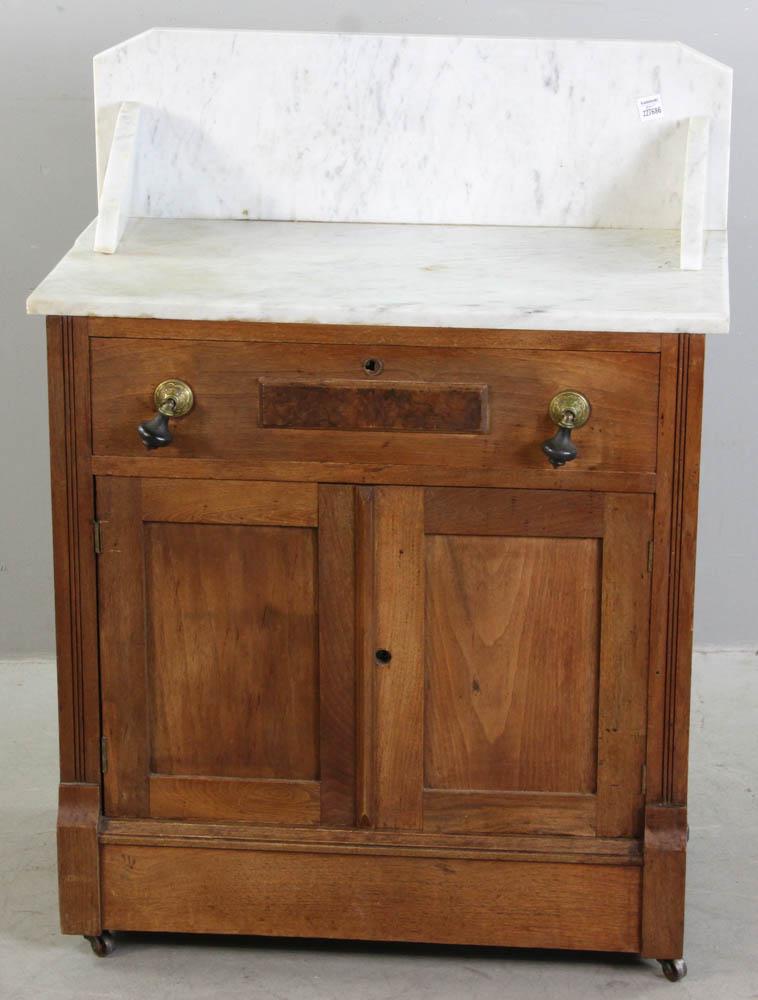Victorian Marble Top Commode: Victorian marble-top, two-door commode with splash back, 34" x 27" x 15". Provenance: Acton, Massachusetts collection.