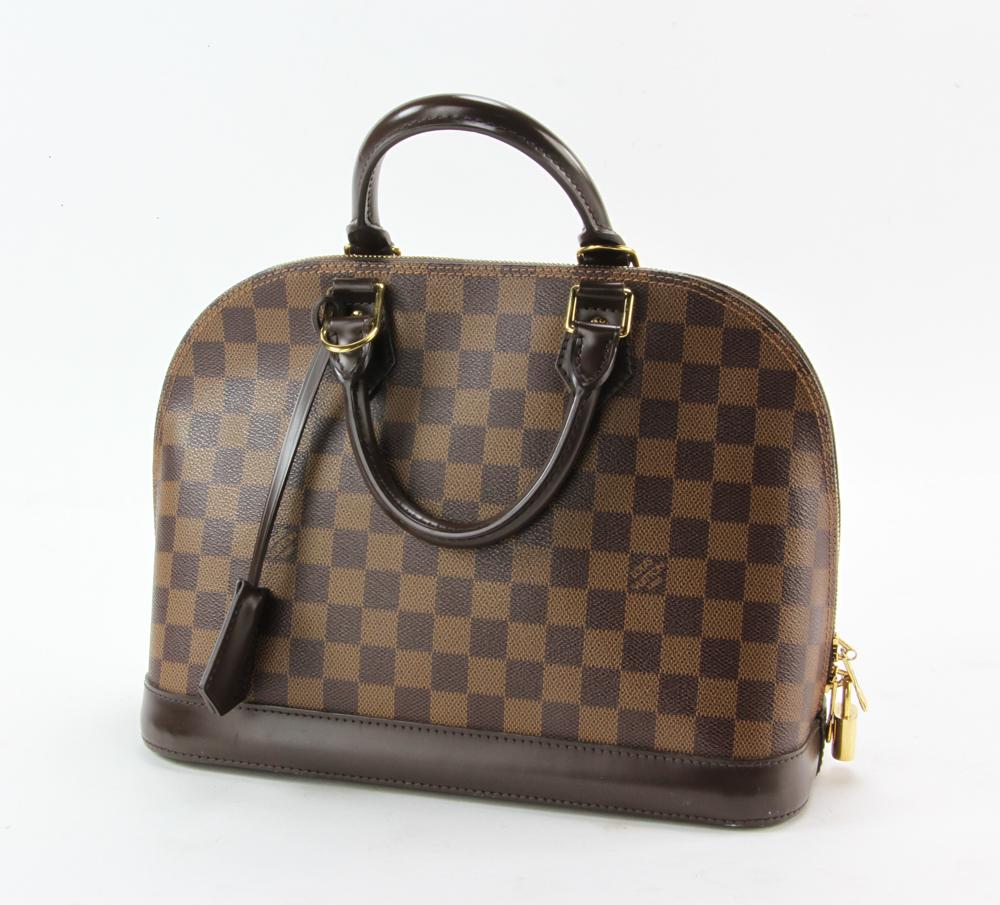 Louis Vuitton Paris Brown Handbag: Louis Vuitton Paris brown handbag with key and lock. Provenance: From a California collector.