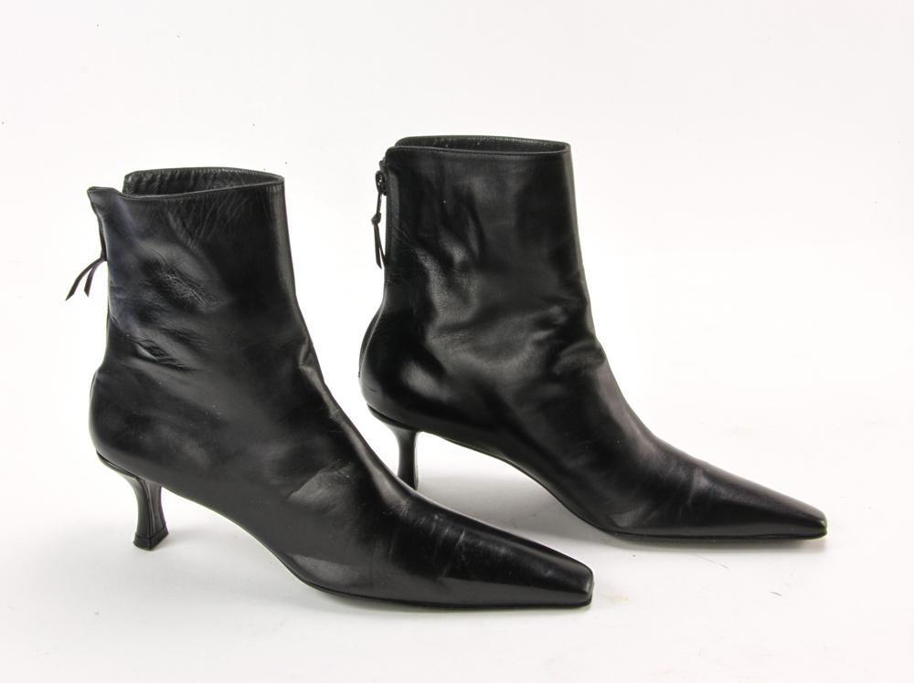Stuart Weitzman Black Leather Ankle Boots: Stuart Weitzman black leather ankle boots, size 6 1/2 narrow. Provenance: From a California collector.