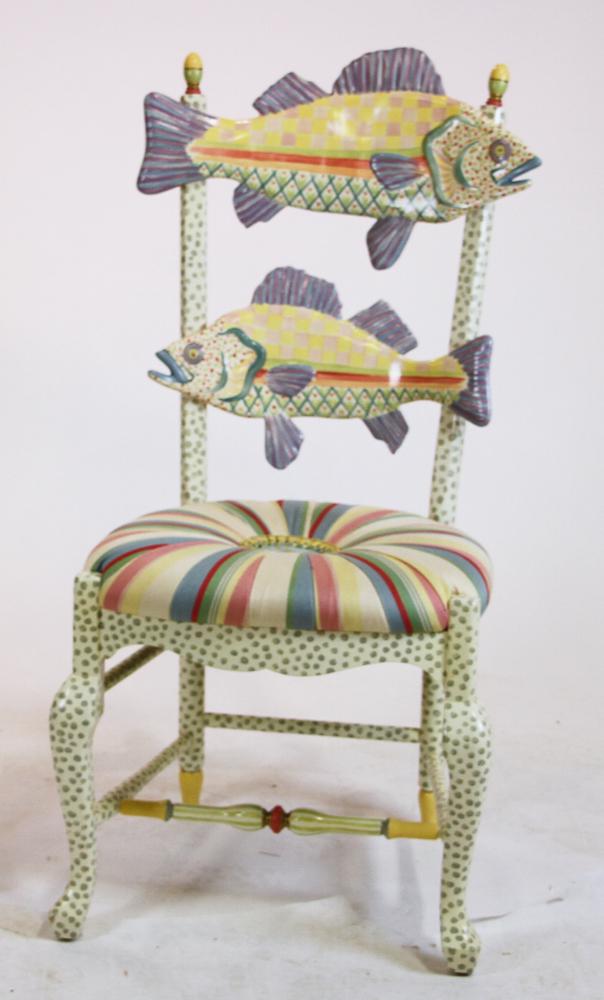 Signed MacKenzie-Childs Fish Motif Chair: Signed MacKenzie-Childs hand-painted chair with carved fish back, 42" H x 22" W (overall) x 18" D (seat). Provenance: From a Palm Beach, Florida estate.