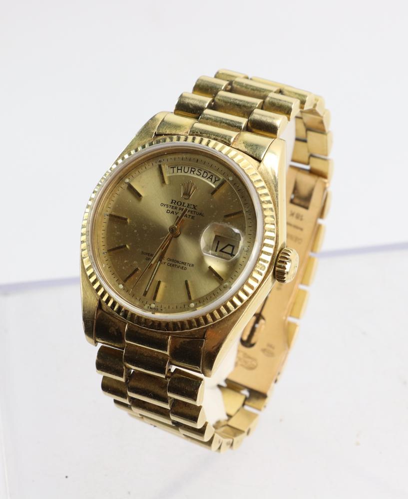 Rolex Oyster Perpetual 18k Gold Watch: Rolex Oyster Perpetual Day-Date watch, 18k gold with sapphire face and extra links, approximately 123 grams TW (including extra links). Purchased in 1974, previously owned by Hans Klein. Provenance: F