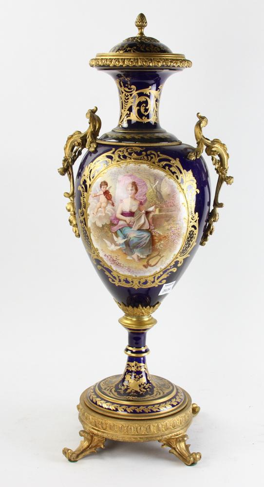 19thC French Sevres Hand Painted Cobalt Blue Urn: 19th century French Sevres hand-painted cobalt blue covered urn with bronze mounts, signed 'F. Lacoste', 27" x 12".