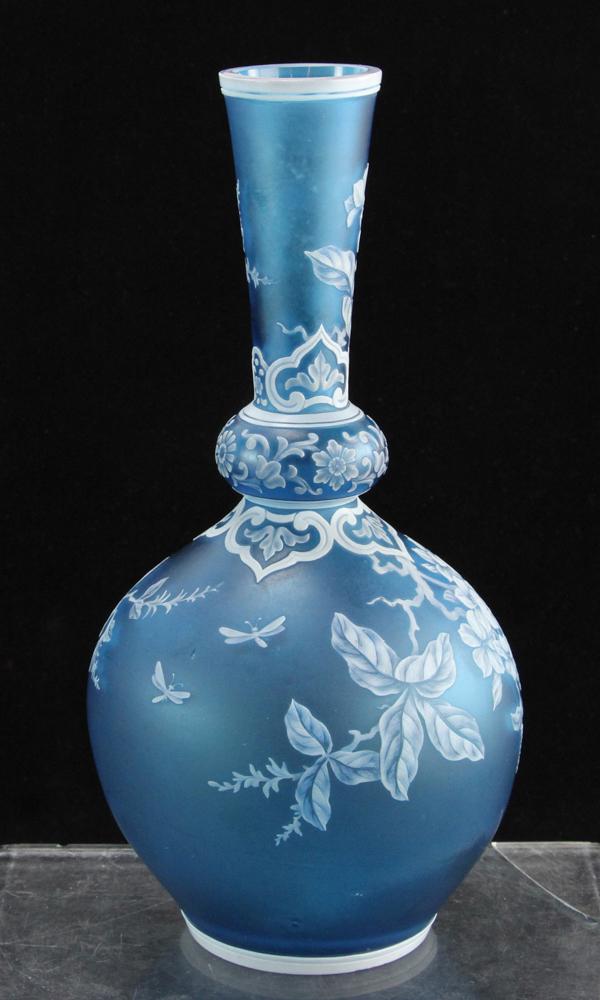 English Bottle Shaped Cameo Glass Vase: English bottle-shaped cameo glass vase, white-cut-to-blue, marked with Webb signature butterflies, 12 1/2" H. Provenance: From the Keenan Family estate of North Miami, Florida.