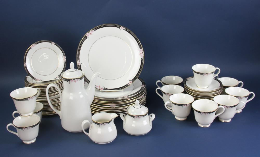 Royal Doulton Enchantement Dinner Service for 12: Enchantment by Royal Doulton Dinner service for 12, to include: (12) dinner plate; (12) salad plates; (12) bread and butter plates; (12) dessert plates; (12) cups and saucers; cream and sugar; coffee 