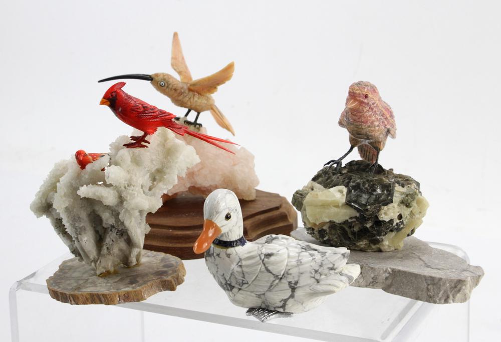 Four Carved Stone Birds: Four carved stone birds, to include: cardinals, pink hummingbird, white and gray duck, and pink sparrow, largest 5". Provenance: From the Keenan Family estate of North Miami, Florida.