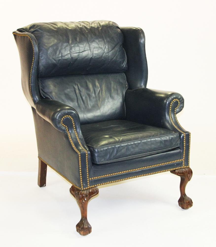 Fine Blue Leather Wing Chair, Hancock Moore: Fine blue leather wing-back chair having ball-and-claw feet by Hancock and Moore, Hickory, North Carolina, 41" H x 35" W x 40" D. Provenance: Wakefield, Massachusetts estate.