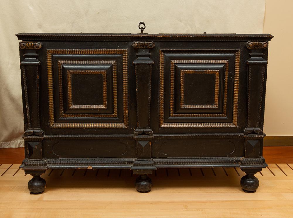 Louis XIII Corsair Chest: Louis XIII "Corsair" chest, ebonized wood and gilt decoration, with heavily engraved complex lock and hinges, 32" H x 49" W x 22" D.