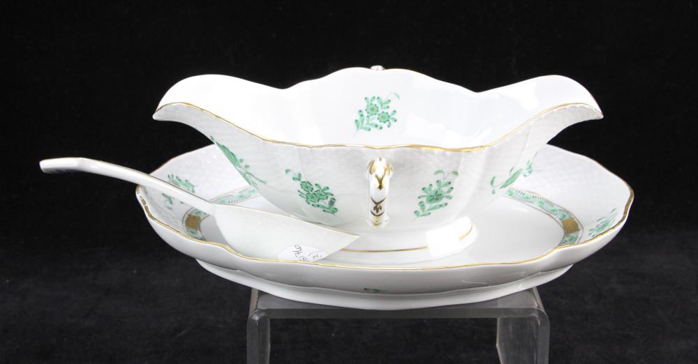 Herend Chinese Bouquet Green Sauce Dish w/ Underplate: Herend porcelain dinnerware, Chinese Bouquet Green, sauce dish with attached underplate and serving spoon, underplate is 10" L, spoon is 7 1/2" L. Provenance: From the Keenan Family estate of North Mi