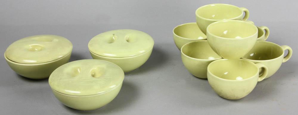 Russel Wright Iroquois China: Partial set of Russel Wright 'Iroquois' china, to include: (3) 5 1/4" bowls; (7) 3 3/4" diameter cups; (3) 5 1/4" bowl lids. Provenance: West Palm Beach, Florida estate.