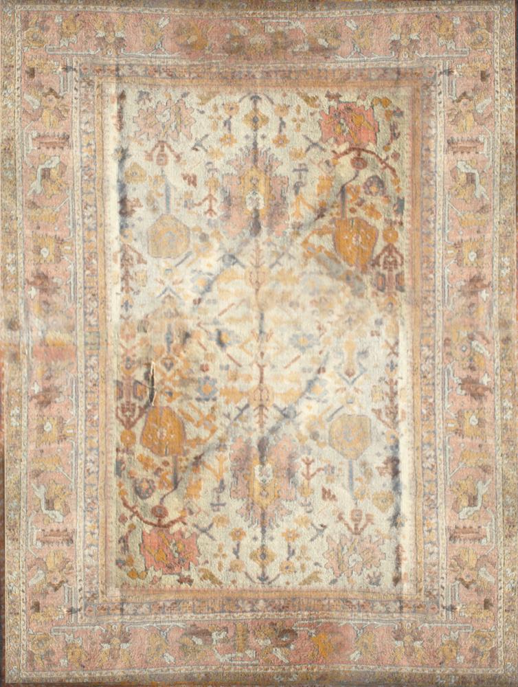 Antique Indian Oushak Rug: Antique Indian Oushak rug, tan, peach, red, yellow tones, 12' 3" x 8' 10". Provenance: Keller Estate, Nahant, Massachusetts.