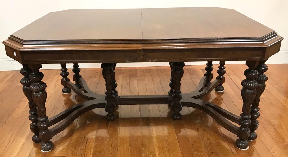 Victorian Style Walnut Dining Table: Victorian-style walnut dining table with two leaves, 31" H x 66" L x 46" W.