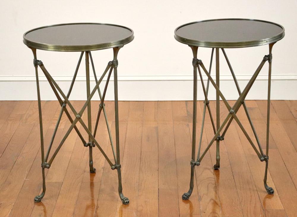 Pair of Brass Stands with Marble Tops: Pair of brass stands with black marble tops, 26 3/4" H x approximately 17" diameter.