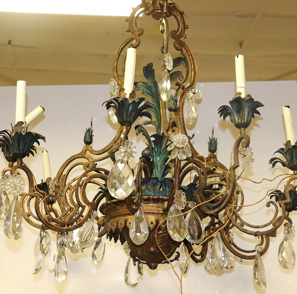 Exceptional Italian Painted Wrought Iron Chandelier: Exceptional Italian painted wrought iron chandelier, circa 1920s, with heavy crystal prisms, similar to the chandelier sold at Mario Buatto Auction, Sotheby's, New York, 41" H x 33" diameter. Provenan