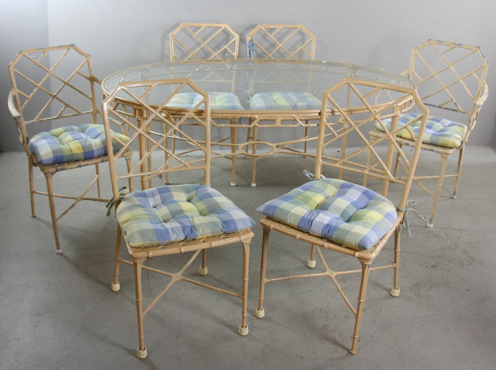 Brown Jordan Calcutta/Chinese Chippendale Set: Brown Jordan Calcutta/Chinese Chippendale faux bamboo furniture set, to include: oval glass top dining table, 29 3/4" H x 59 1/2" L x 40" W; armchair (overall) 34 1/2" H x 19" W x 15 1/2" D; (4) side