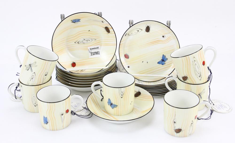 Limoges for Christian Dior Partial Dessert Set: N.B.D. Limoges porcelain for Christian Dior, partial dessert set comprising (7) small cups, (9) small saucers/plates, (8) berry bowls, (24) pieces total, "faux bois" pattern with beetle and butterfly 
