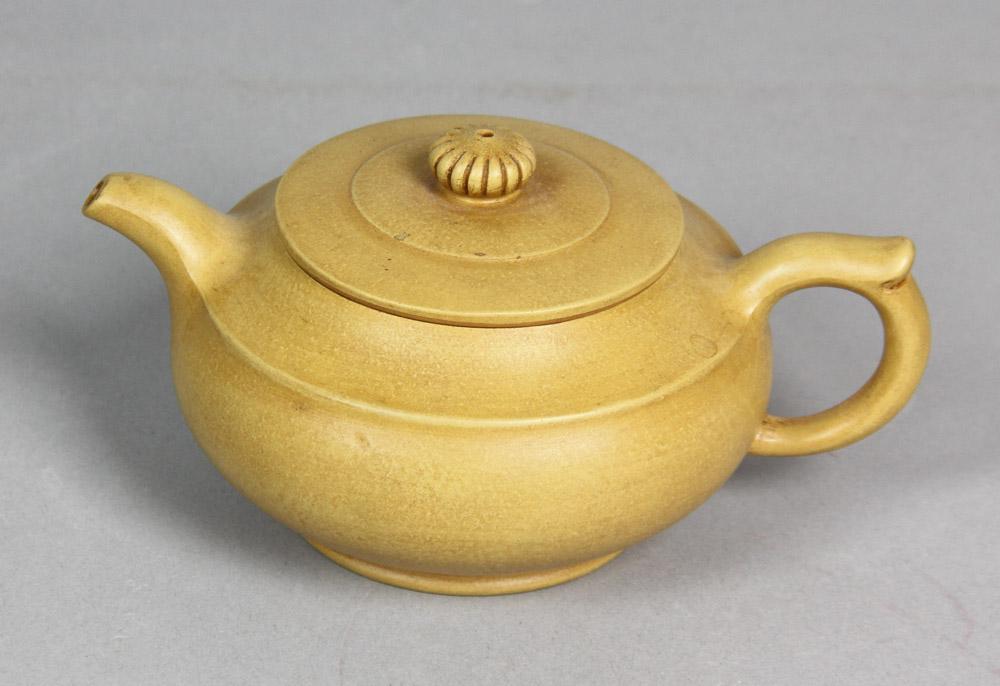 Chinese Yixing Pottery Teapot: Chinese Yixing pottery teapot with Zhou Li Shan zhi mark, 2 1/2" x 6 1/2".