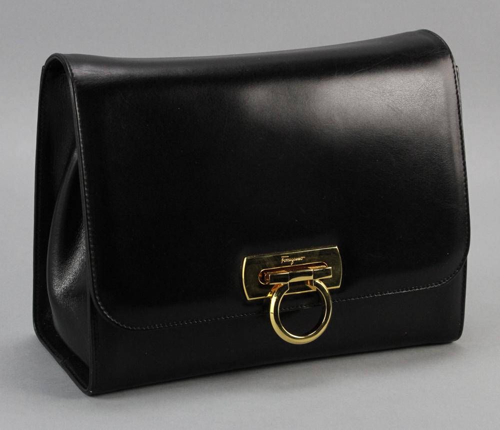 Ferragamo Black Handbag: Salvatore Ferragamo black handbag, 7 1/4" H x 9 1/2" W x 4" D.