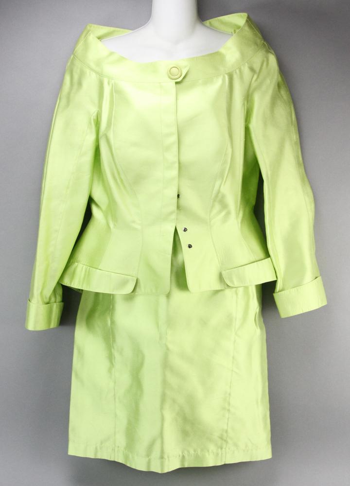 Thierry Mugler Lime Green Silk Suit: Thierry Mugler, Paris, lime green 100% silk satin two-piece suit with skirt, round neck, flared bottom to jacket, straight skirt. Size 44.