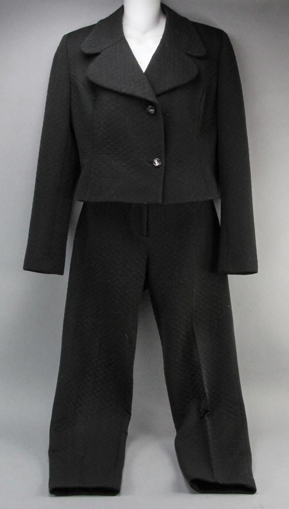Dolce & Gabbana Quilted Blazer and Pants: Dolce & Gabbana black quilted cropped blazer with matching straight leg pants, size 30/44. Provenance: Boston, Massachusetts collection.
