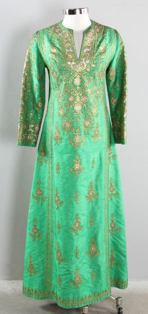 Helene Arpels Hand Woven Caftan: Helene Arpels Inc., New York, NY, iconic green silk caftan with hand-woven design in gold and silver thread.