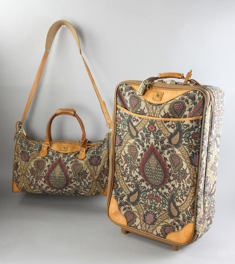 Hartman Luggages: Group of Hartmann luggages, to include: two tapestry, one rolling weekend case, largest 22" x 14 1/2" x 7 1/2", plus a matching duffle. Provenance: From an Ipswich, Massachusetts estate.