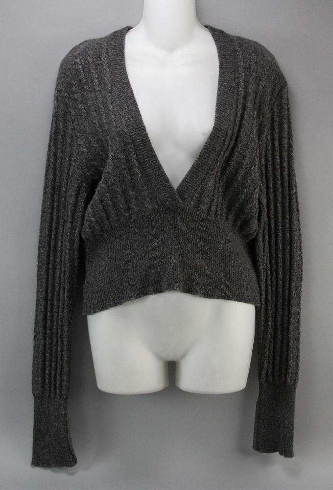 Valentino Cable Knit V-Neck Sweater: Valentino wool, angora and nylon cable-knit, V-neck sweater, size unknown. Provenance: Boston, Massachusetts collection.