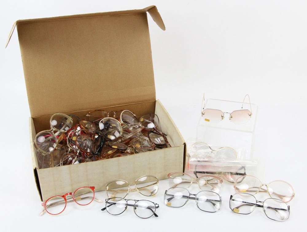 Group of Designer Eyeglass Frames: Group of unused designer eyeglass frames to include Anne Klein, Safilo, Zeiss, Rodenstock, Cheryl Tieg, etc., forty-eight (48) total, some with lenses, others without.
