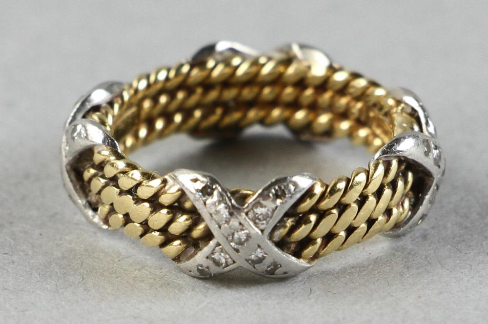 Tiffany & Co. Schlumberger Gold, Platinum and Diamond: Tiffany & Co. Schlumberger 18K yellow gold, platinum and diamond three-row rope 'X' ring. This iconic ring has thirty-six (36) round brilliant diamonds set in platinum, approximately 5 grams TW, size 