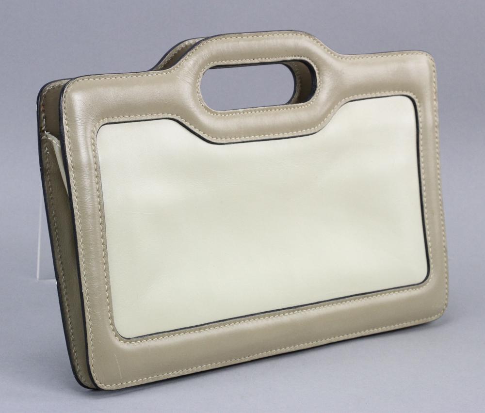 Anne Klein 1970s Tan Leather Handbag: Anne Klein for Calderon 1970s tan/beige leather handbag, 8" H (not including handles) x 12 7/8" L x 1 1/2" W. Provenance: Santa Barbara, California estate.