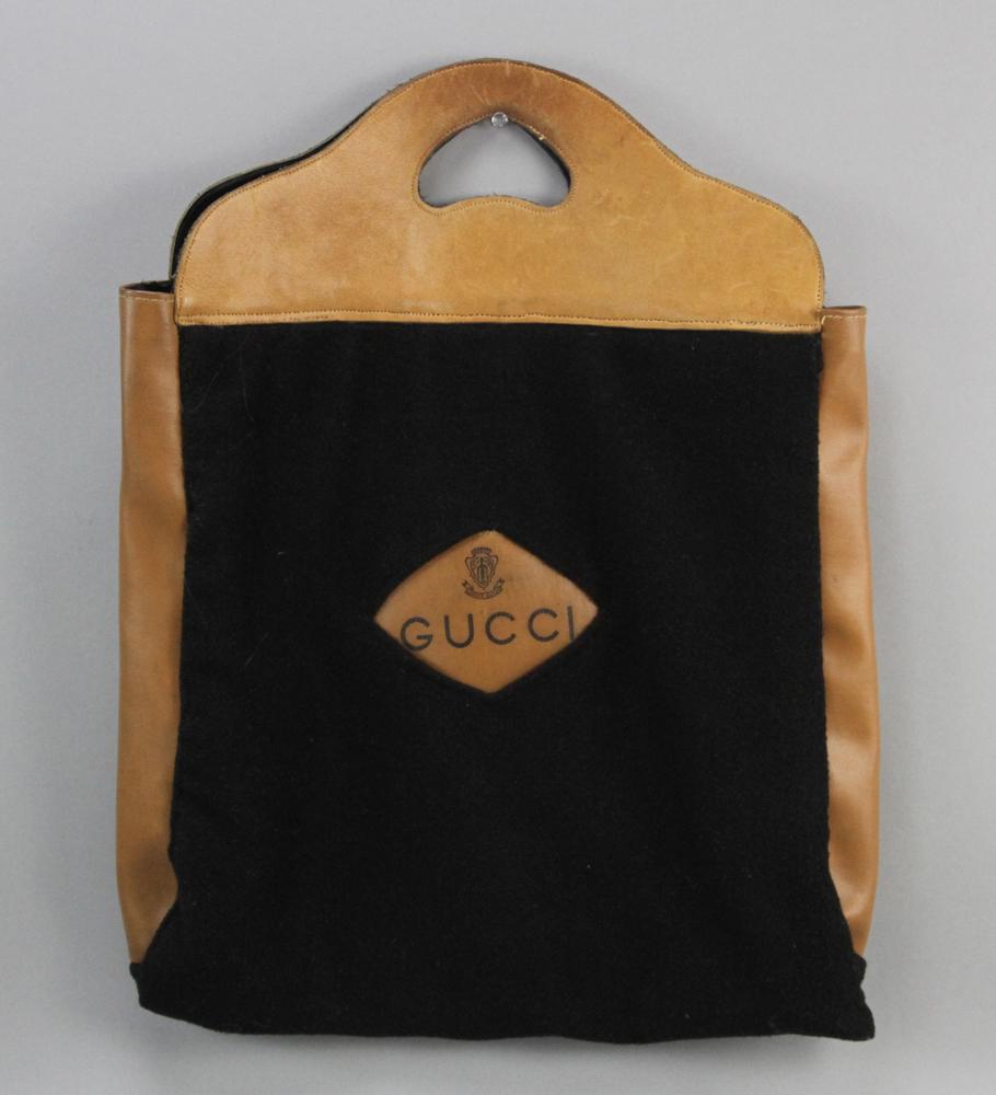 Gucci Black Wool and Tan Leather Tote: Vintage Gucci black wool and tan leather tote with Gucci leather logo. Provenance: Boston, Massachusetts collection.