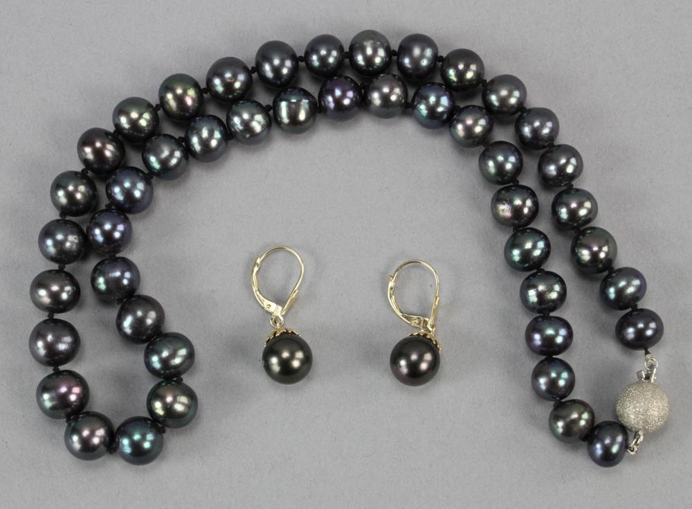Black Pearl Necklace and Earrings: Black pearl necklace with 18k white gold and diamond clasp, forty-five (45) pearls approximately 8.0 - 9.5mm. 17" L, together with a pair of 14k yellow gold and black pearl earrings, approximately 9.5
