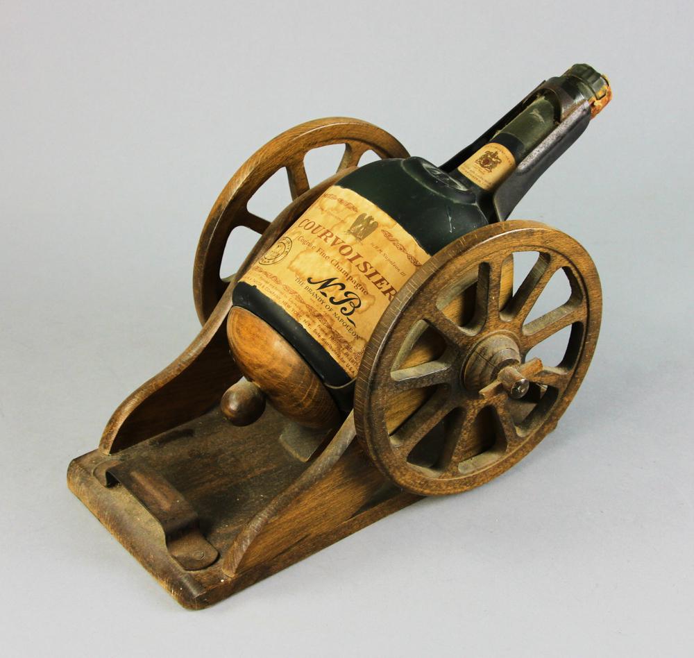 Courvoisier Napoleon Cognac Fine Champagne: Courvoisier Cognac Fine Champagne, "N.B. The Brandy of Napoleon", 84 proof, 4/5 quart, sealed, in pouring cradle, S/N A17008. Provenance: La Jolla, California collection.