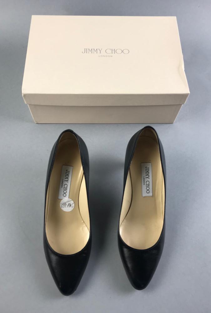 Jimmy Choo London Black Pumps: Jimmy Choo London black pumps, size 38 1/2. Provenance: From a Boca Raton, Florida estate.