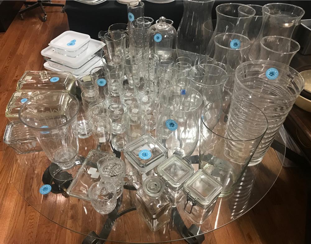 Glass Vases, Hurricane Lamps, Pitchers, Etc: Large table group of glass vases, hurricane lamps, crystal stemware and barware, vintage covered containers, beer and root beer pitchers.