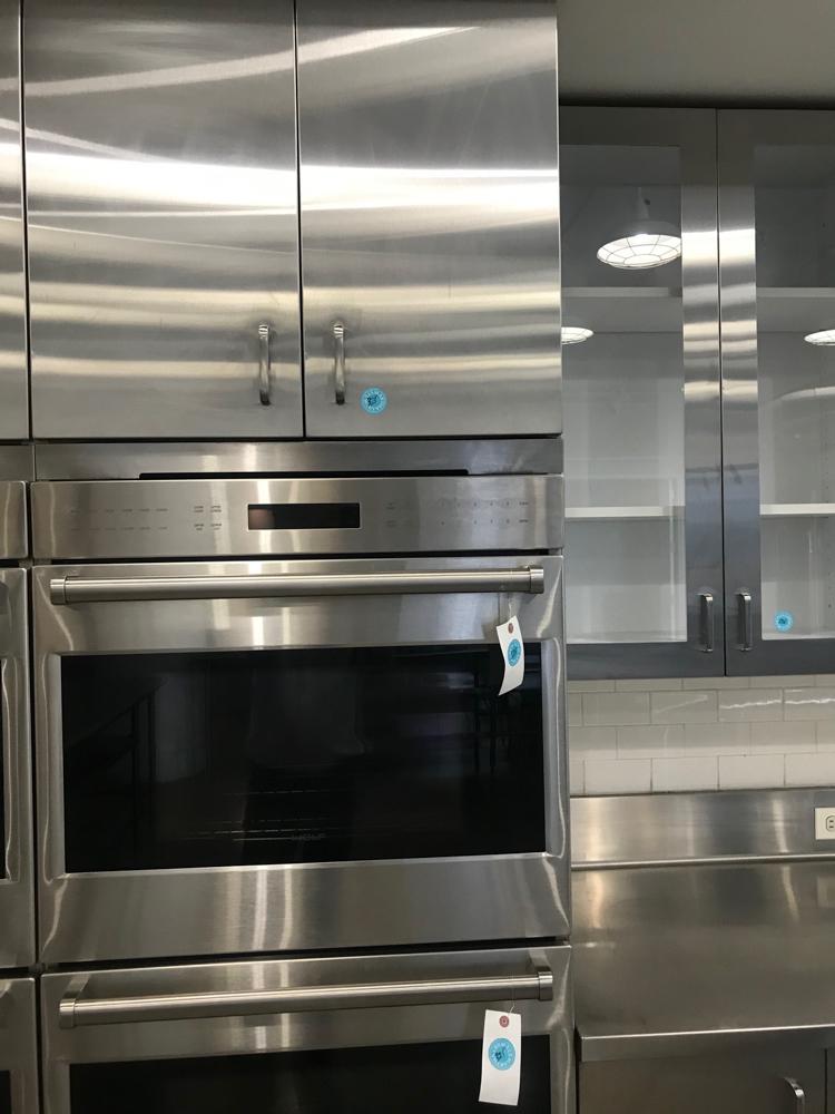 Wolf Double Convection Ovens: Wolf double convection ovens with cabinets above and drawer below, 97" H x 30" W x 27" D. To be picked up at the Starrett Lehigh building, 601 West 26th St - Suite 900, New York, NY 10001, by appointm
