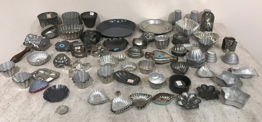 Vintage Pastry and Chocolate Molds: Large collection of vintage pastry and chocolate molds, some with animals.