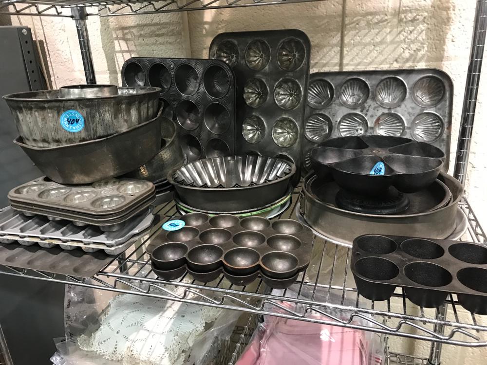 Antique Cast Iron and Tin Molds: Collection of antique and unusual cast iron and tin mold.