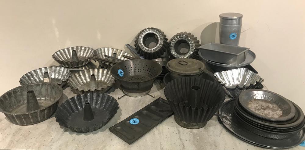 Antique Bunt Cake Bowls, Pie Pans, Etc: Large collection of antique bunt cake bowls, pie pans, and iron skillets.