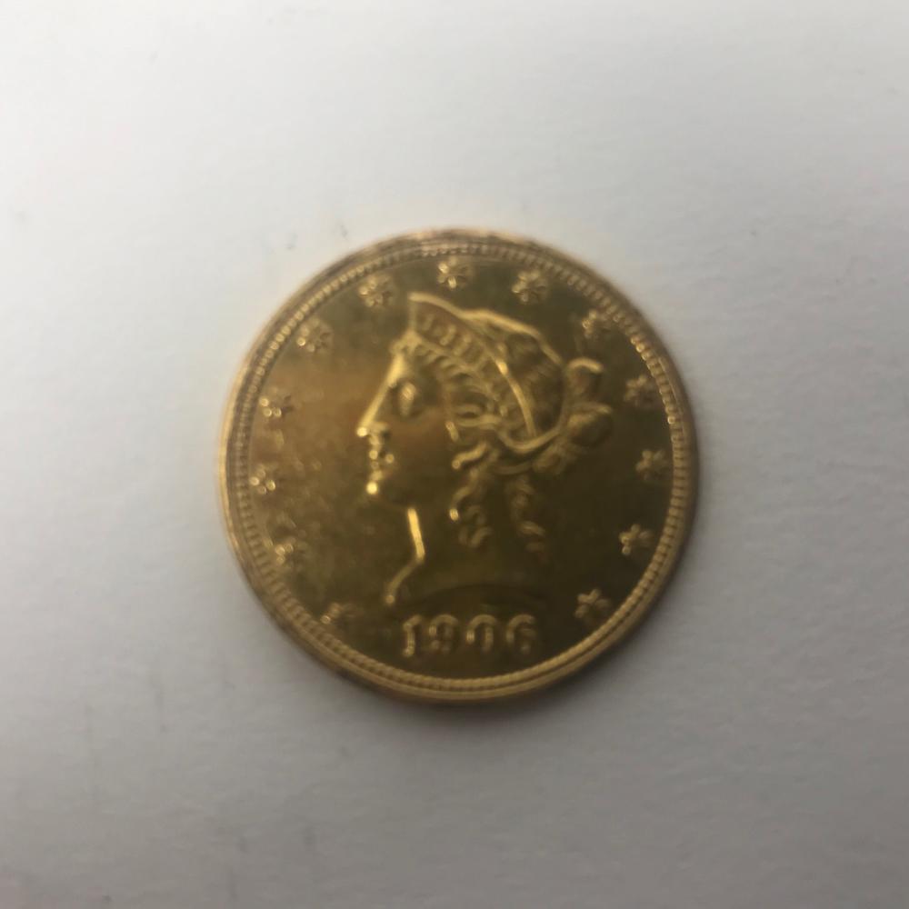 1906 US Ten Dollar Gold Coin: 1906 US ten dollar gold coin, mint mark D. Provenance: From a Westwood, Massachusetts estate. PLEASE NOTE: payment for silver, gold, jewelry and coins must be made via PayPal, cash, or bank wire trans