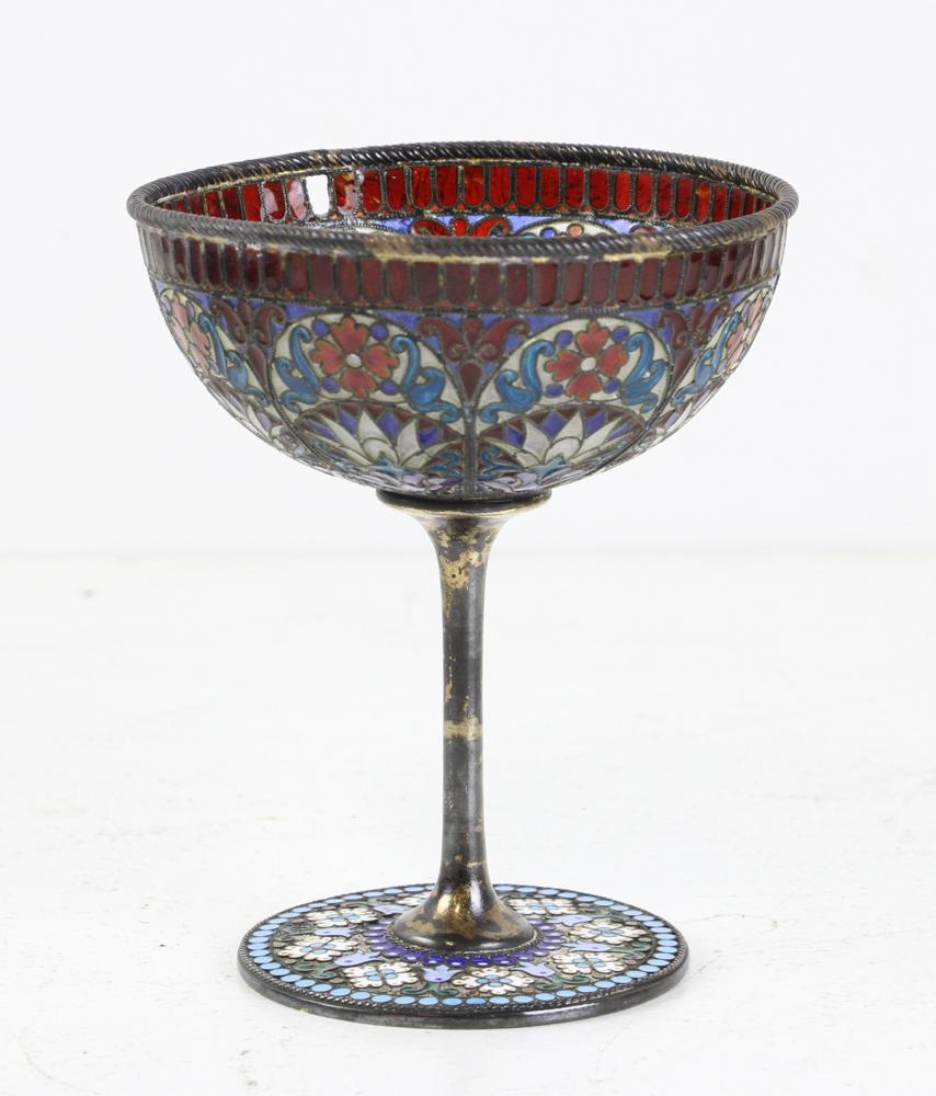 Plique a Jour Sterling Silver Glass: Plique-a-jour stemware glass with vermille wash over sterling silver, one of the ruby panels on border is missing, 4 1/4" H x 3 1/2" diameter.